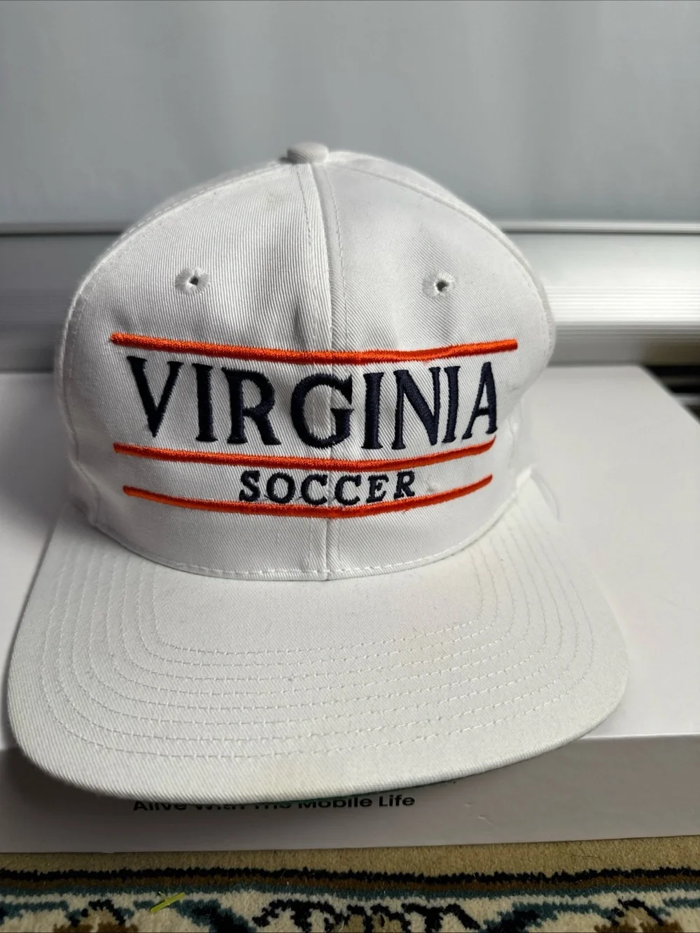Vintage Virginia Soccer White Snapback Hat with Orange Accent